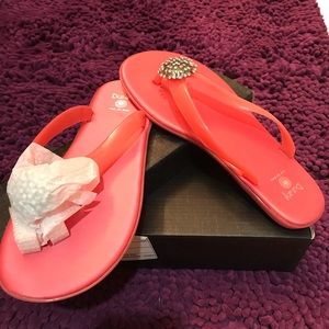 Coral color flip flops